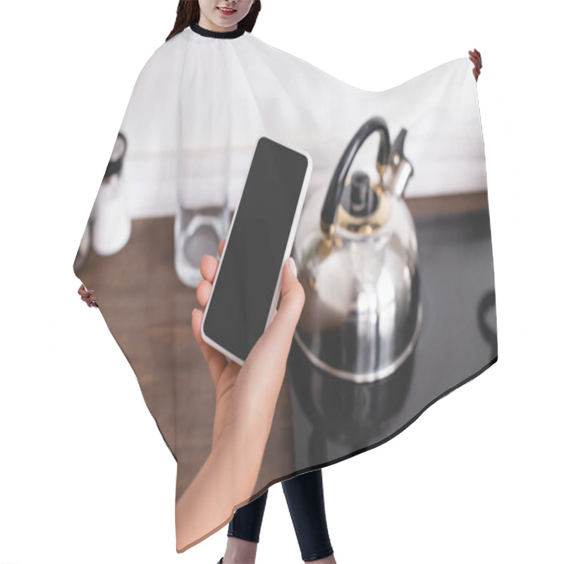 Personality  Cropped View Of Woman Holding Smartphone With Blank Screen Near Kettle On Stove  Hair Cutting Cape