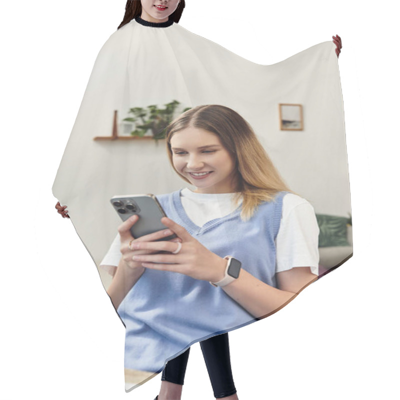 Personality  A Teenage Girl Relaxes In Her Cozy Room, Engaging With Her Smartphone While Smiling. Hair Cutting Cape