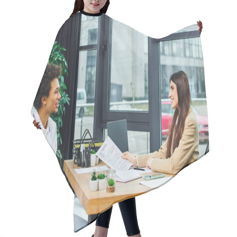 Personality  Professional Man And Woman Discuss At Desk In Modern Office Setting. Hair Cutting Cape