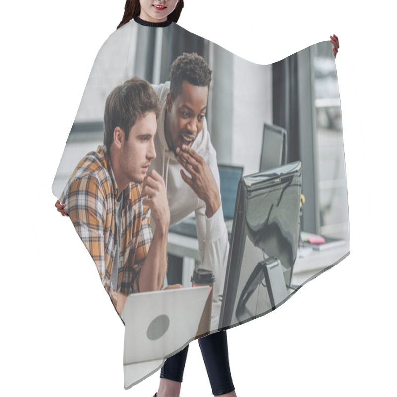 Personality  Two Thoughtful Multicultural Programmers Looking At Computer Monitor While Working In Office Together Hair Cutting Cape