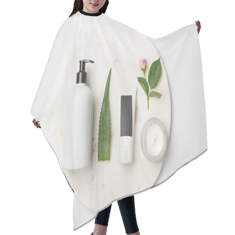 Personality  Top View Of Different Cosmetic Containers, Aloe Vera Leaf And Rose Flower On White Round Surface Hair Cutting Cape