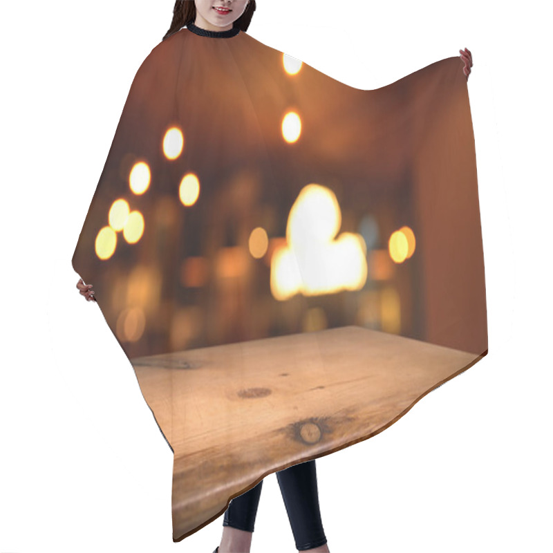 Personality  Old Wood Table With Smoke In The Dark Background. Hair Cutting Cape