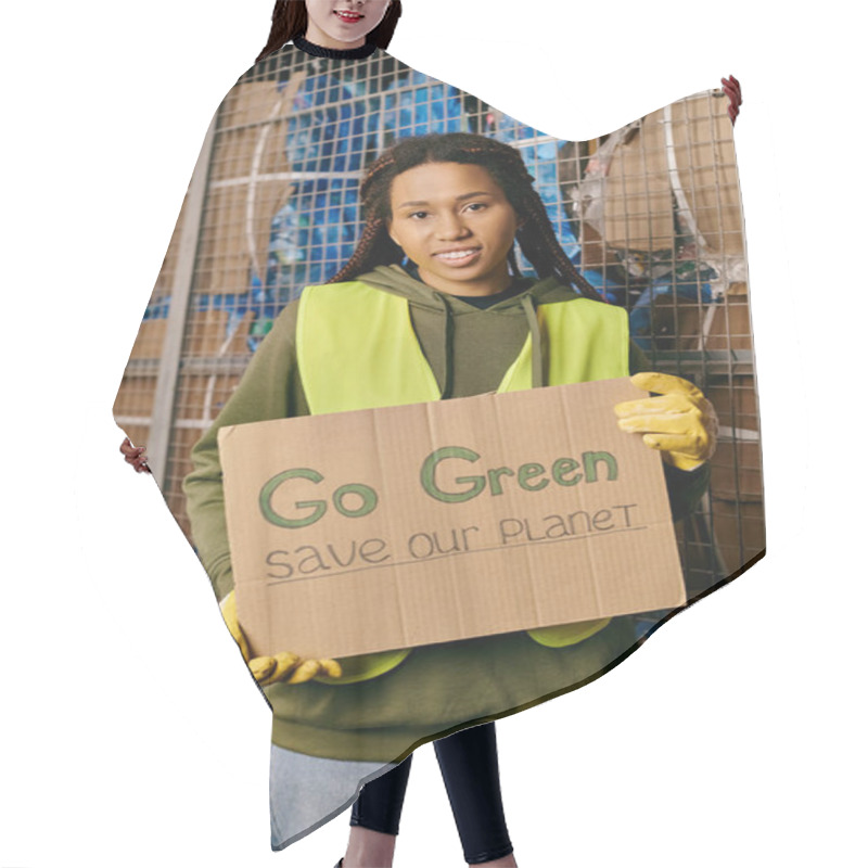 Personality  A Woman In Gloves And Safety Vest Holds A Sign Urging To Go Green And Save Our Planet. Hair Cutting Cape