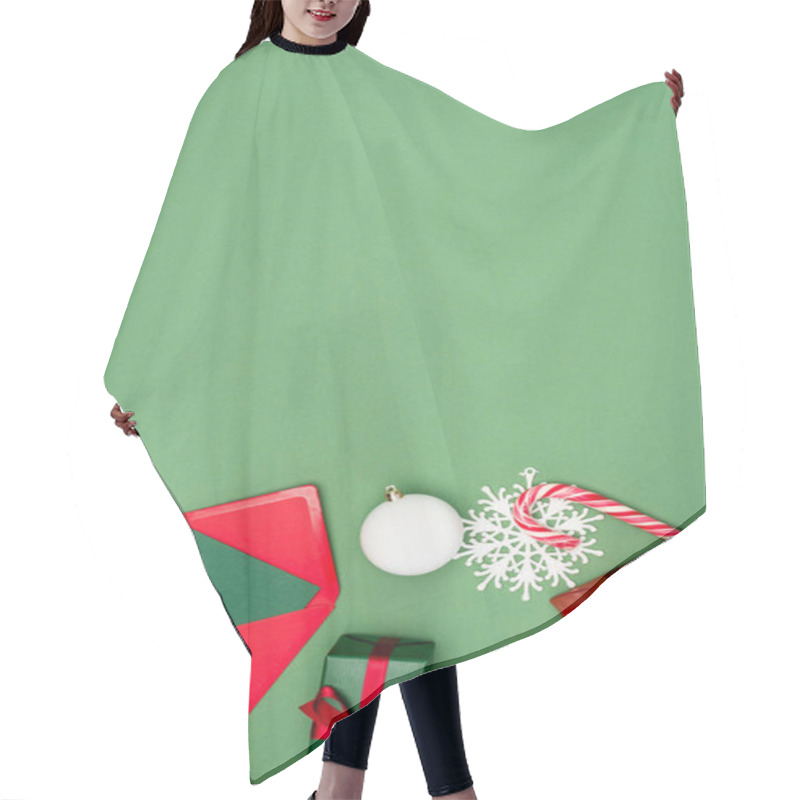 Personality  Top View Of Gift Box, Envelope With Card, Christmas Ball, Candy Canes And Decorative Snowflakes On Green Background With Copy Space Hair Cutting Cape