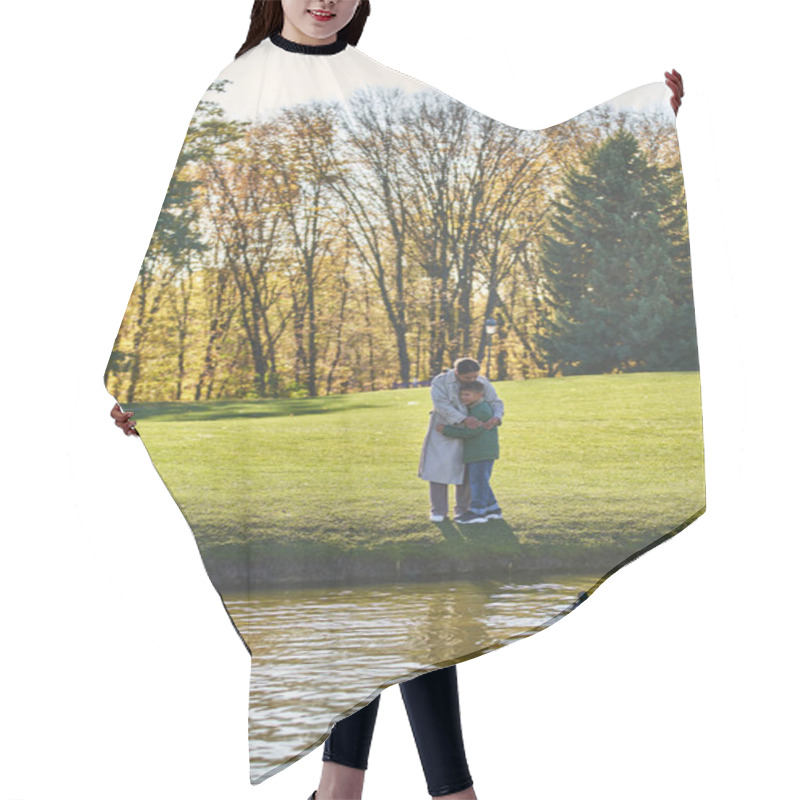 Personality  Joyful African American Mother And Son Hugging Near Lake, Ducks, Woman And Boy In Outerwear, Nature Hair Cutting Cape