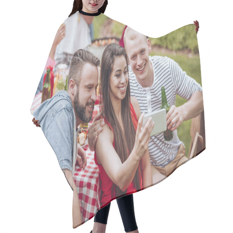 Personality  Group Of Young Fiends Sitting By A Table And Taking A Selfie During Spring Weekend Outdoor Picnic In The Garden Hair Cutting Cape