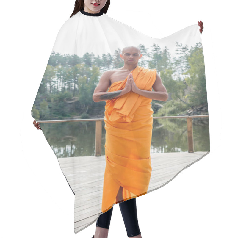 Personality  Full Length View Of Buddhist Monk Meditating With Praying Hands On Wooden Platform Near Forest Lake Hair Cutting Cape