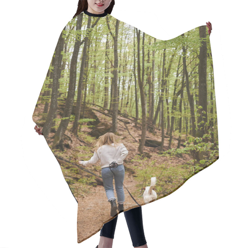 Personality  Back View Of Active Blonde Woman Running With Her Cute White Dog While Hiking In Forest Hair Cutting Cape