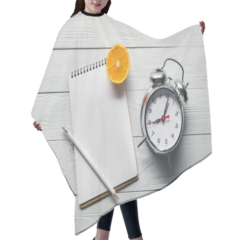 Personality  Top View Of Orange Half, Blank Notebook And Pencil Near Alarm Clock On Wooden White Background Hair Cutting Cape