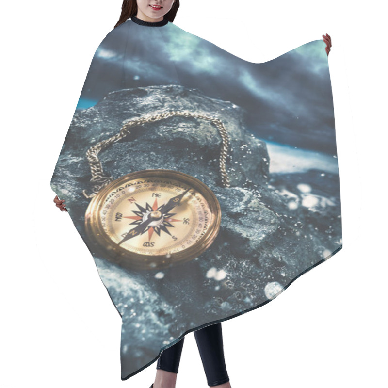 Personality  Compass On Rocks With A Dark Sky Hair Cutting Cape