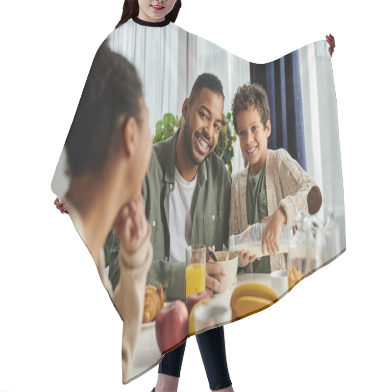 Personality  Close-knit African American Family Sharing Food And Conversation At The Table. Hair Cutting Cape