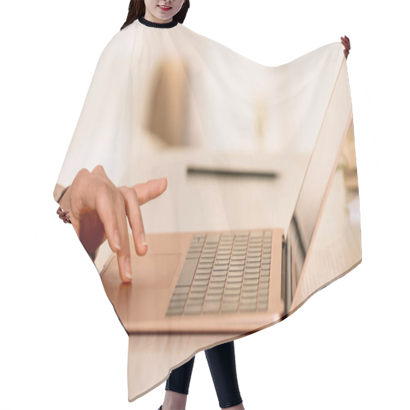 Personality  Cropped View Of Freelancer Using Laptop Touchpad On Desk Hair Cutting Cape