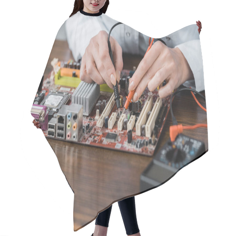 Personality  Cropped Shot Of Electric Engineer With Tester Examining Computer Motherboard Hair Cutting Cape