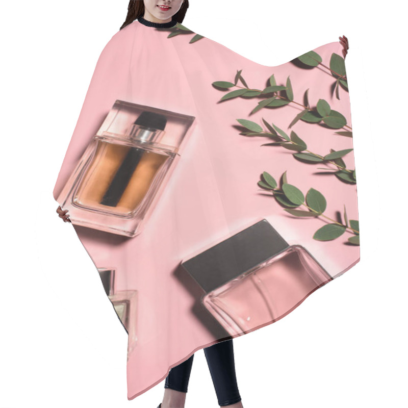 Personality  Top View Of Bottles Of Perfumes With Green Branches On Pink Surface Hair Cutting Cape