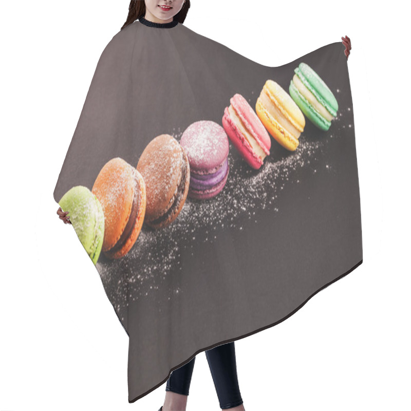 Personality  Row Of Macaroons On Black Hair Cutting Cape