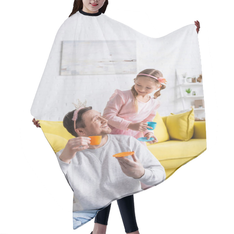 Personality  Happy Dad And Daughter Looking At Each Other While Holding Toy Cups In Living Room Hair Cutting Cape