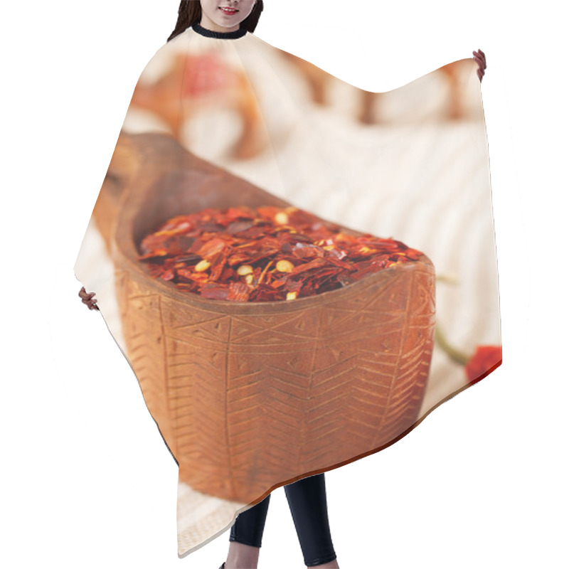 Personality  Red Chillies Paper Flakes In Curved Wooden Bowl And Camel Carava Hair Cutting Cape