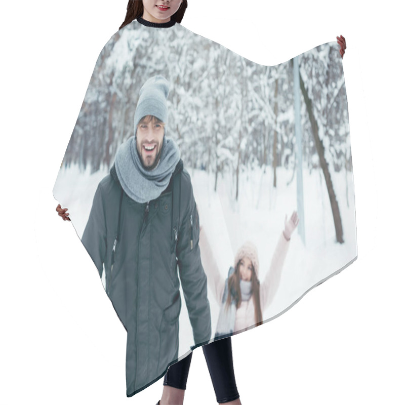 Personality  Young Couple Sledging Together On Winter Day In Park Hair Cutting Cape