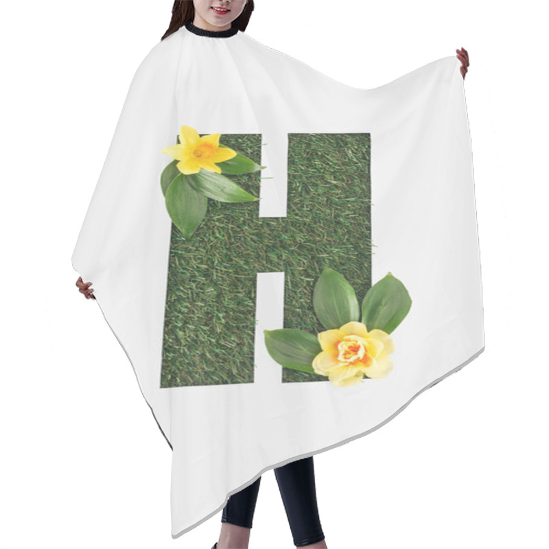 Personality  Top View Of Cut Out H Letter On Green Grass Background With Leaves And Yellow Daffodils Isolated On White Hair Cutting Cape