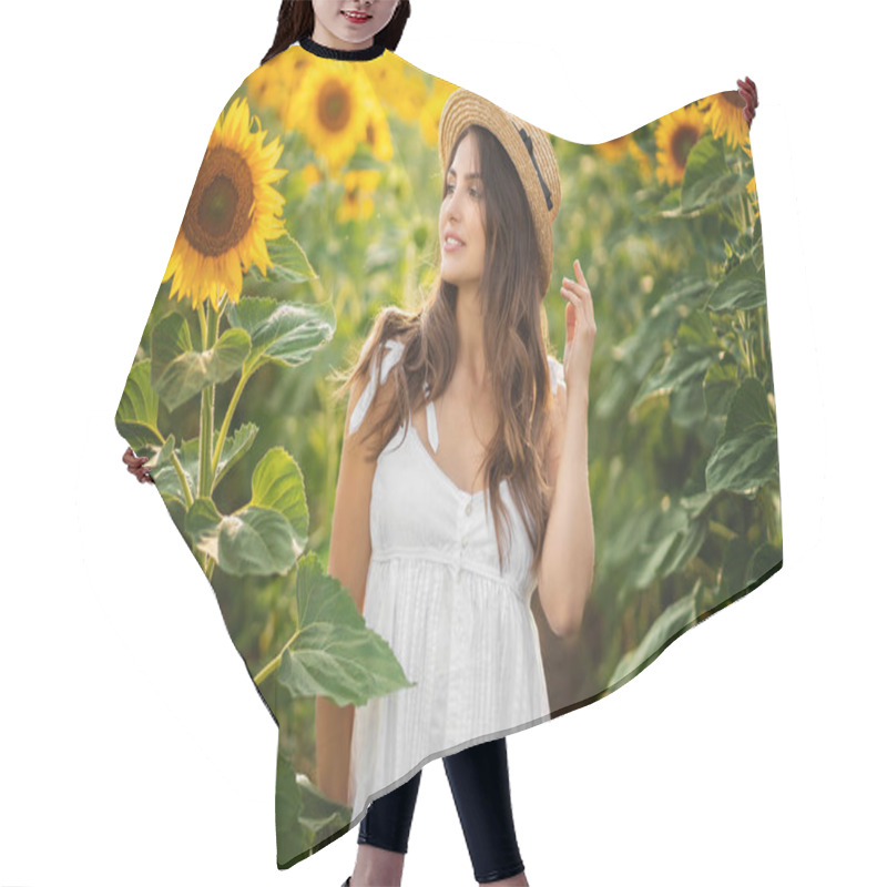 Personality  Beautiful Woman In White Dress On The Flowering Field Looking Away. Hair Cutting Cape