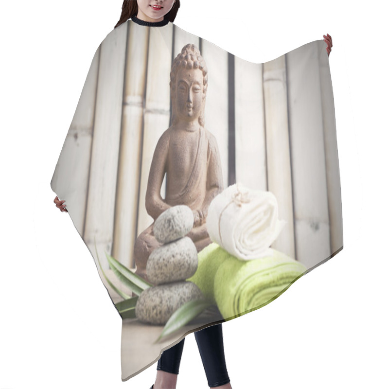 Personality  Wellness And Spa Concept With Buddha Figure Hair Cutting Cape