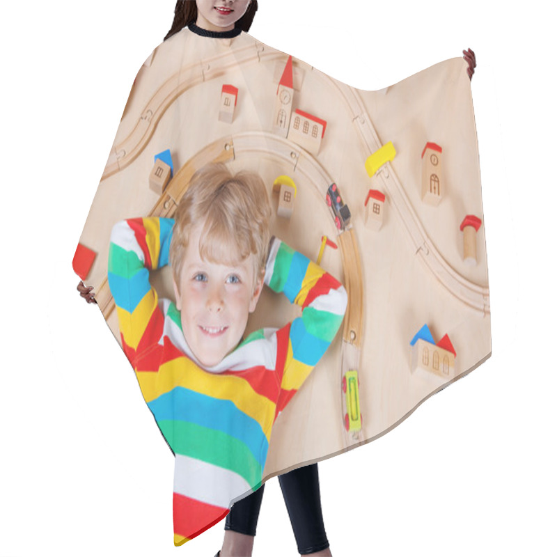 Personality  Little Blond Child Playing With Wooden Railroad Trains Indoor Hair Cutting Cape