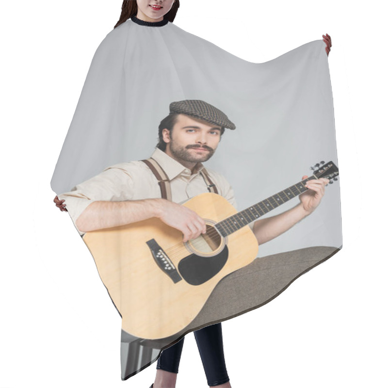 Personality  Man With Mustache In Retro Style Clothing And Hat Playing Acoustic Guitar Isolated On Grey  Hair Cutting Cape