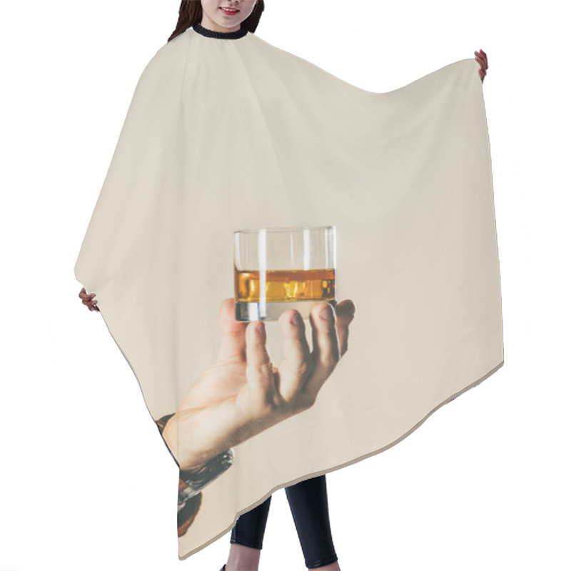 Personality  Cropped Shot Of Man Holding Glass Of Whiskey Isolated On Beige Hair Cutting Cape