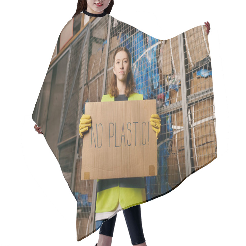 Personality  Young Volunteer In Gloves And Safety Vest Holds A Sign Saying No Plastic While Sorting Waste. Hair Cutting Cape