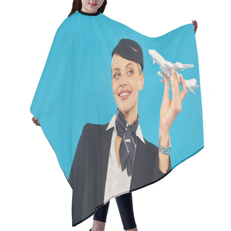 Personality  Joyous Air Hostess In Uniform Of Commercial Airlines Posing With Airplane Model On Blue Backdrop Hair Cutting Cape