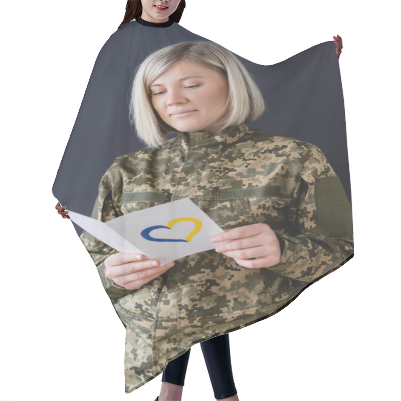 Personality  Woman In Military Uniform Reading Postcard With Blue And Yellow Heart Isolated On Black Hair Cutting Cape