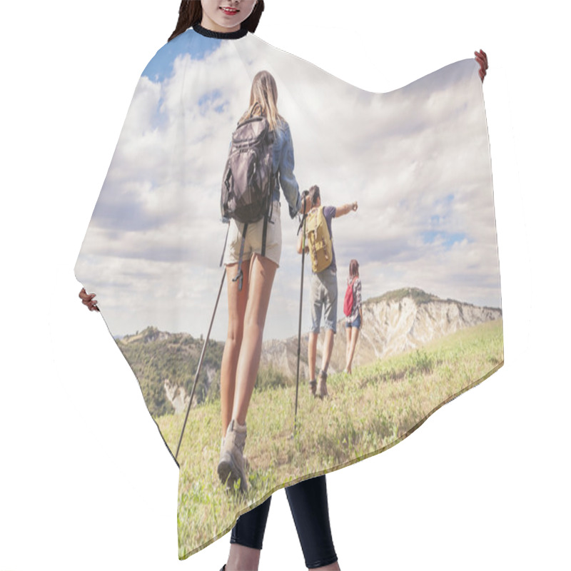 Personality  Group Of Young Hikers In The Mountain In Single File Hair Cutting Cape