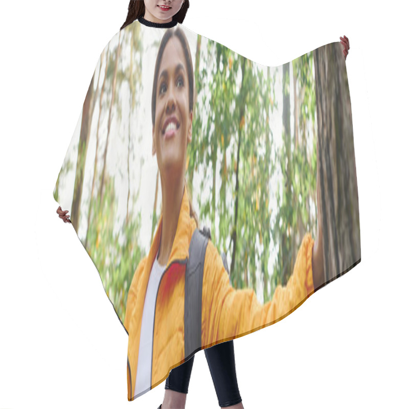 Personality  A Young Woman Embraces The Beauty Of Nature While Hiking Through A Colorful Autumn Forest. Hair Cutting Cape