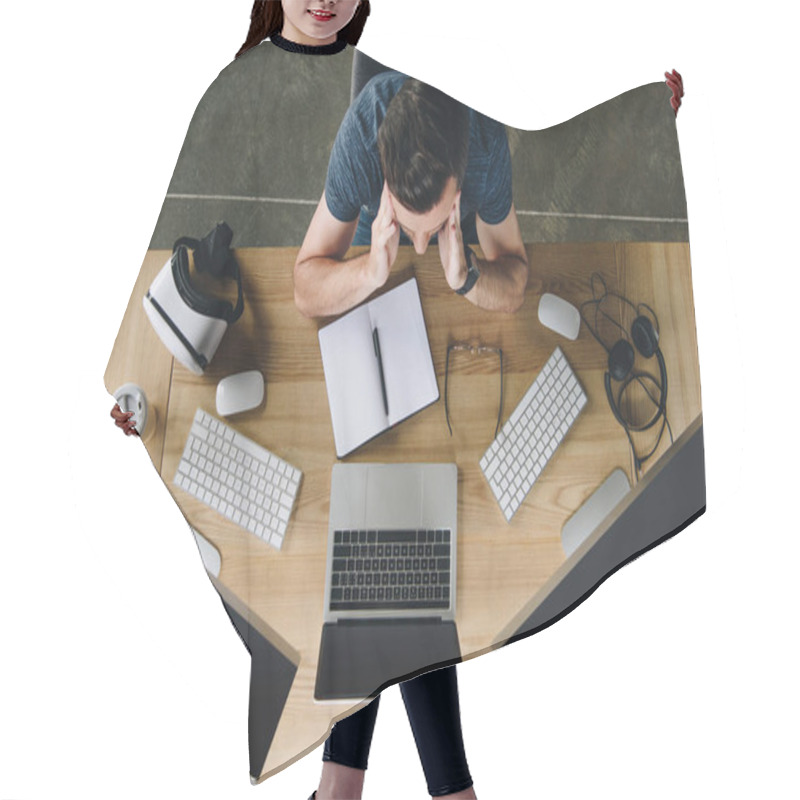 Personality  Overhead View View Of Focused Young Man Working With Laptop And Desktop Computers Hair Cutting Cape