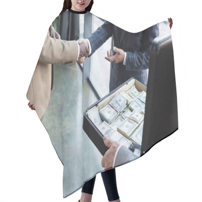 Personality  Partial View Of Interracial Business Colleagues Shaking Hands Near Man Holding Briefcase With Money Hair Cutting Cape