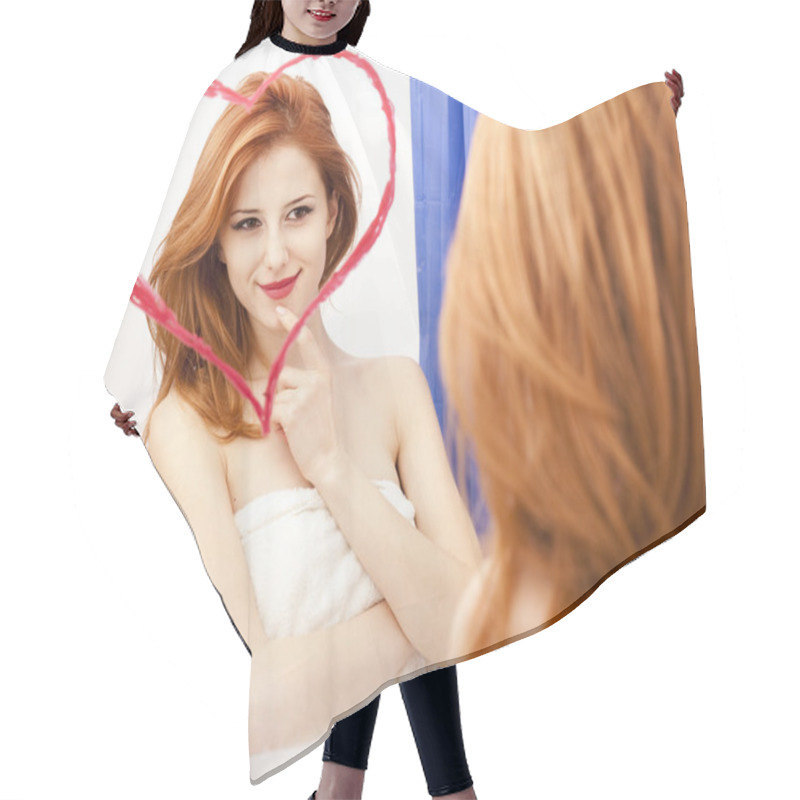 Personality  Redhead Girl Near Mirror With Heart At It In Bathroom. Hair Cutting Cape