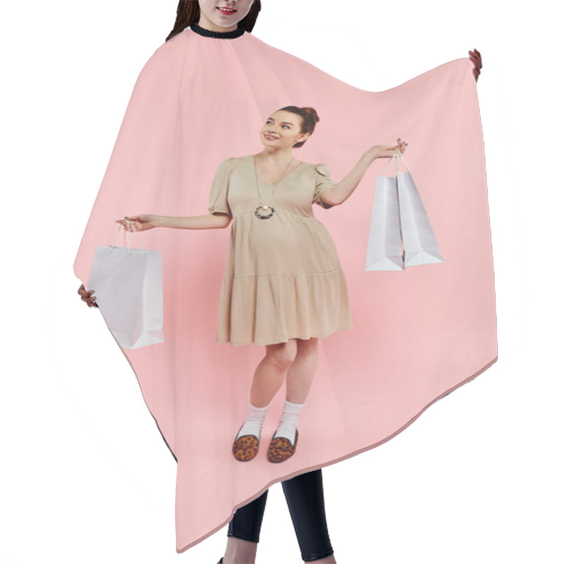 Personality  A Young Pregnant Woman In An Elegant Dress Holding Shopping Bags On A Pink Background. Hair Cutting Cape