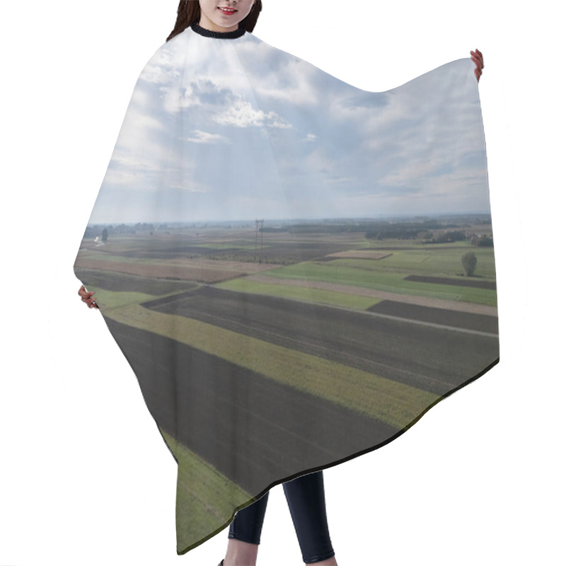 Personality  Aerial View Of Lush Green And Black Farmland Showcasing Agricultural Landscapes Under A Cloudy Sky. Perfect For Nature And Rural Themes. Hair Cutting Cape