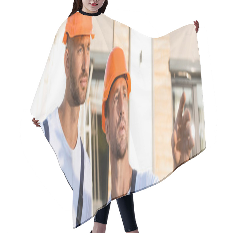 Personality  Panoramic Shot Of Builder Pointing With Hand Near Colleague Outdoors  Hair Cutting Cape