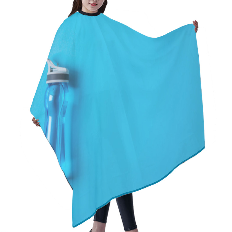 Personality  View From Above Of Sport Bottle With Water Isolated On Blue, Minimalistic Concept  Hair Cutting Cape