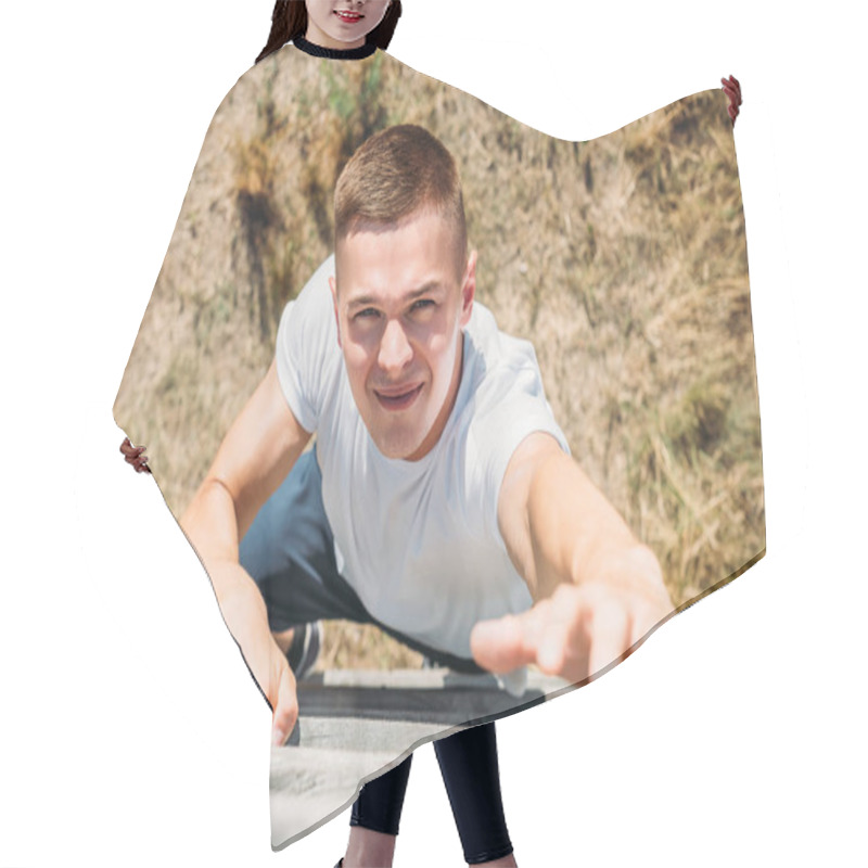 Personality  Overhead View Of Young Soldier Climbing Wooden Barrier During Obstacle Run On Range Hair Cutting Cape