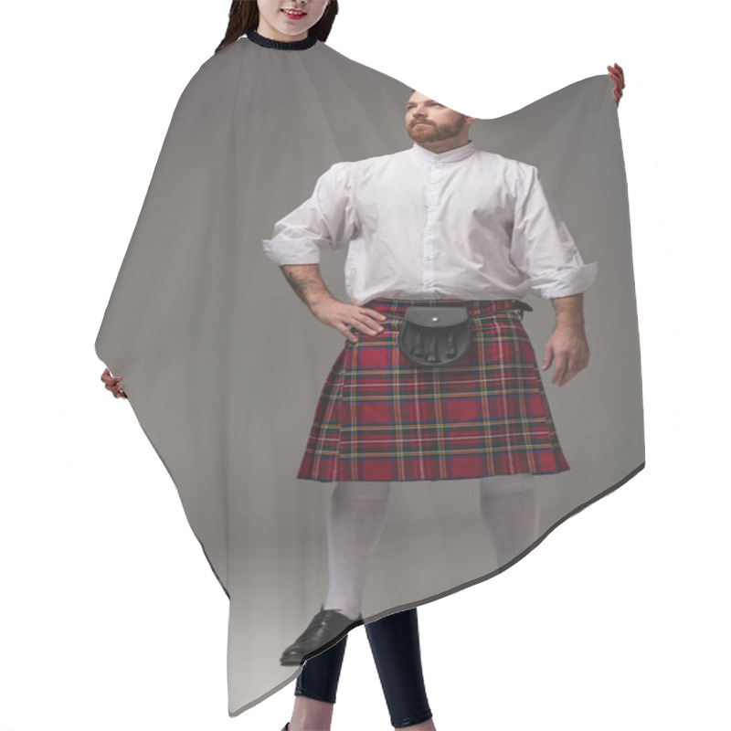 Personality  Scottish Redhead Man In Red Kilt With Hand On Hip Looking Away On Grey Background Hair Cutting Cape