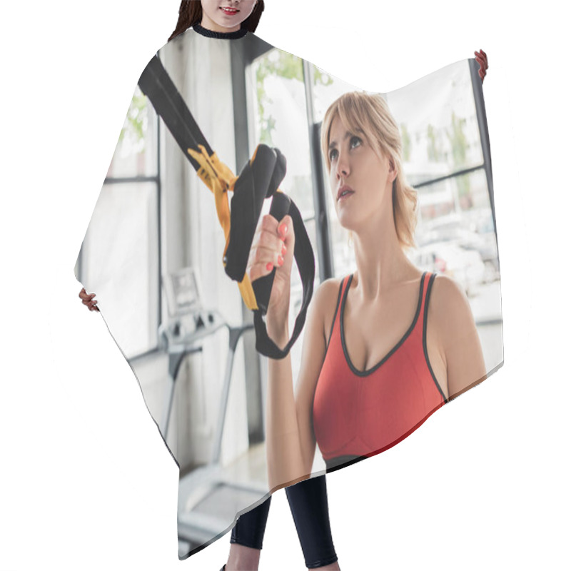 Personality  Selective Focus Of Attractive Sportswoman Working Out With Elastics In Gym  Hair Cutting Cape