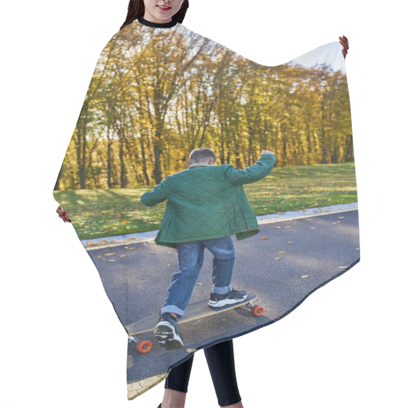 Personality  Back View Of Boy In Outerwear And Jeans Riding Penny Board In Park, Autumn, Golden Leaves, Cute Kid Hair Cutting Cape