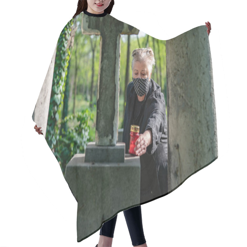 Personality  Senior Woman In Mask In A Cemetery Hair Cutting Cape