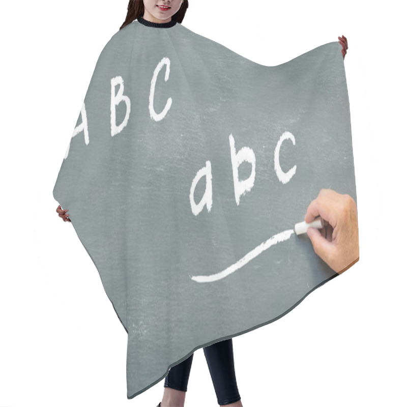 Personality  Hand Writing On A Chalkboard The Letters Abc Hair Cutting Cape