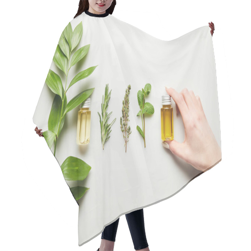 Personality  Partial View Of Woman Holding Bottle With Essential Oil On White Background Hair Cutting Cape