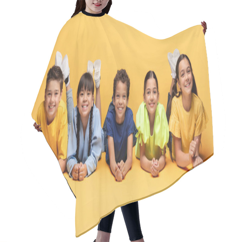 Personality  Diversity, Portrait Of Happy Multiracial Children Lying On Floor And Smiling Together On Yellow Background. Happiness Or Excited, Group Of Friends Kids Have Fun, Enjoying Games, Childhood Concept Hair Cutting Cape