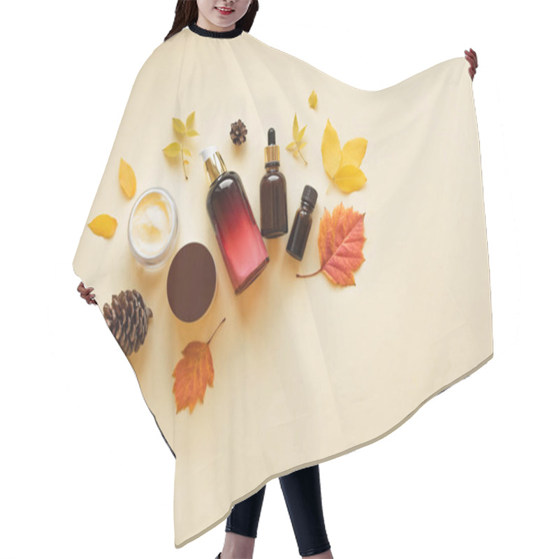 Personality  Autumn Skin Care Products And Autumn Leaves On Yellow Background, Flat Lay, Copy Space.  Seasonal Beauty Routine And Organic Cosmetic Concept. Hair Cutting Cape