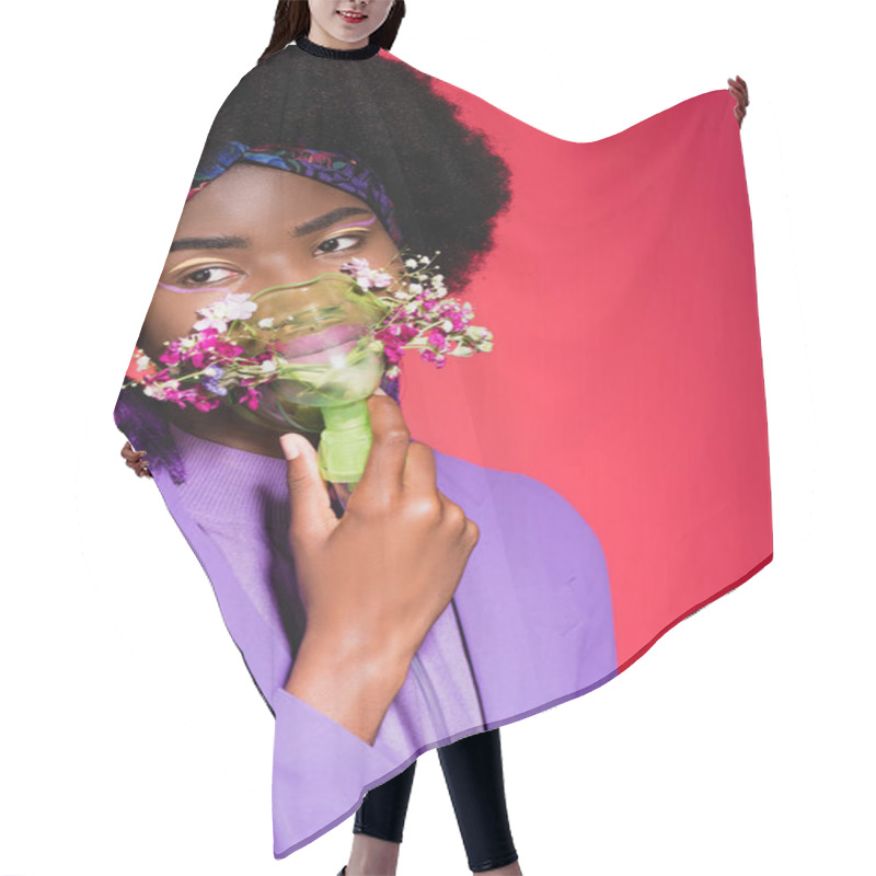 Personality  African American Young Woman In Purple Stylish Outfit With Flowers In Inhaler Isolated On Red Hair Cutting Cape